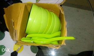 Green Plastic Bowls And Soup Spoons In Box