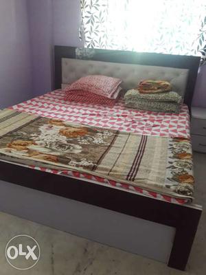 King size bed with storage and one bed side