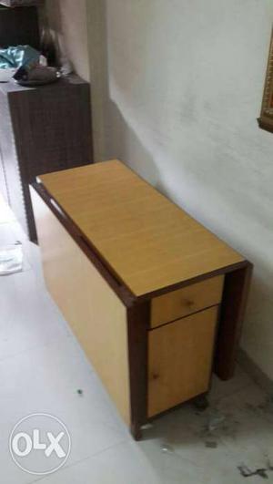 Openable dinning table for 6 with storage. Very