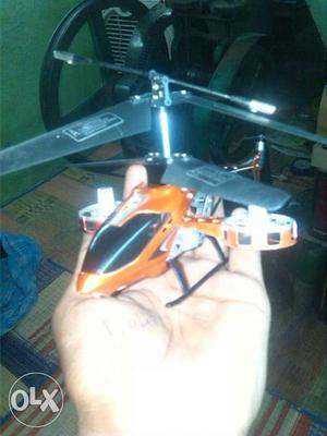 Orange And Gray Helicopter Toy