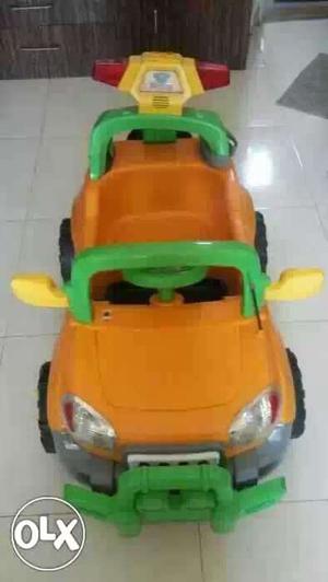 Orange And Green Ride On Car Toy