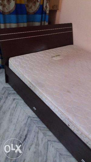 Queen size cot and godrej spring bed is ready for sale