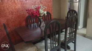 Six seater wooden dining table