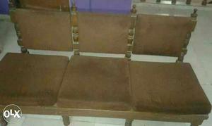 Three Brown Wooden Padded Chairs