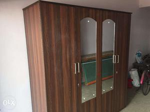 Twin door wooden wardrobe with mirrors