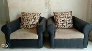 Two Black Leather Beige Suede Padded Club Chairs
