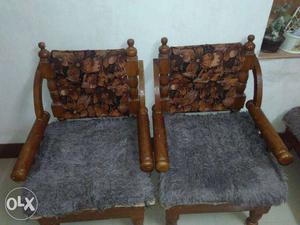 Two Brown Wooden Base Grey Fur Padded Armchairs