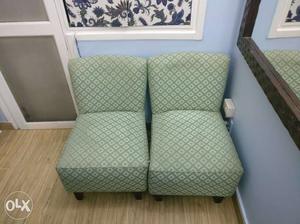 Two Green Padded Chairs
