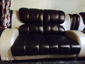 White And Brown Leather Loveseat