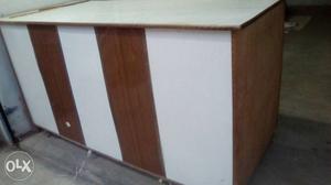 White And Brown Wooden Dest counter