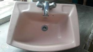 White Ceramic Bathroom Sink With Stainless Steel Faucet
