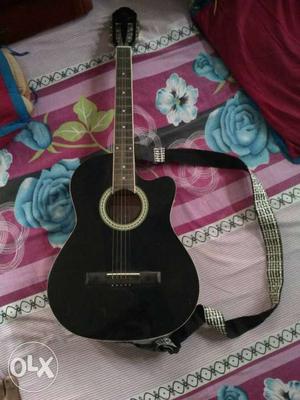 A good quality KAPS acoustic guitar.. only 1 year
