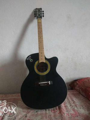 Black And Yellow Acoustic Guitar