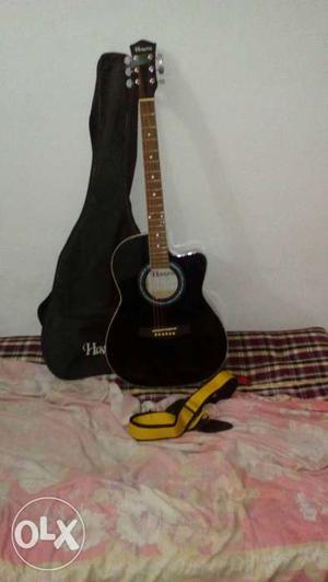 Black Cutaway Acoustic Guitar And Guitar Bag