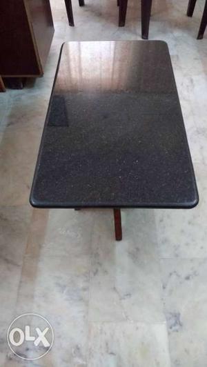 Center table with black galaxy granite