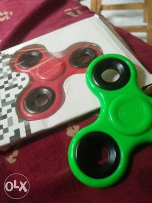 Green, Red, And Black Fidget Spinners