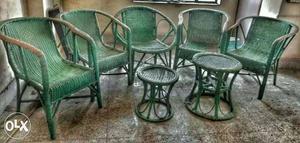 Set of green cane chair, morrah and table