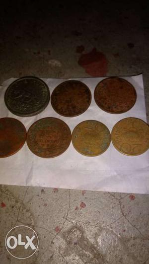 Seven Bronze And Silver Round Coins