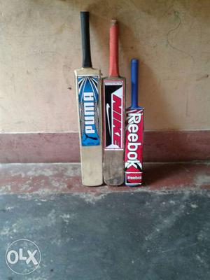 Three Black,brown,blue, And Red Cricket Bat