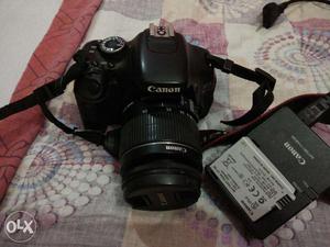 Cannon DSLR with mm lens, camera bag