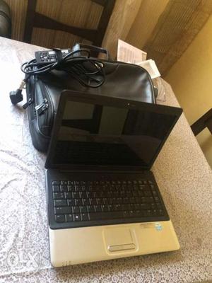 Its an HP laptop. its with a leather bag