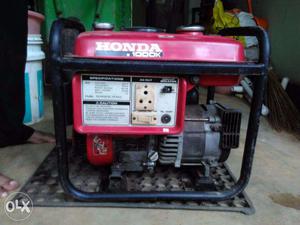 Red And Black Honda Portable Generator