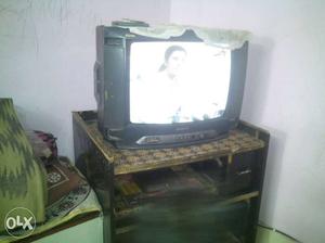 Samsung 20 inch. Black CRT TV with TV trolley