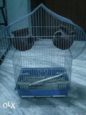 Blue And Silver Bird Cage