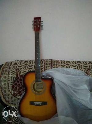 Its a new guitar bought from Nigeria.
