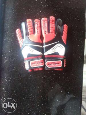 Pair Of Black, White, And Red Action Gloves
