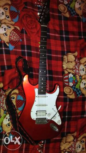 Red And White Stratocaster Electric Guitar