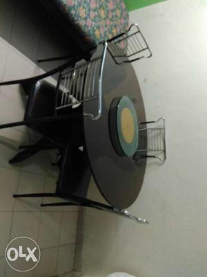 Revolving dining table with chairs in very good