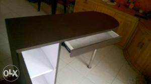 Writing table with storage drawer
