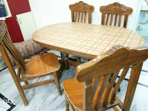 4 seater wooden dining table in good condition.