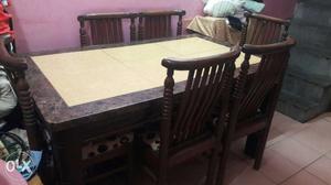 6 Seater Dinning table with marble top in gud