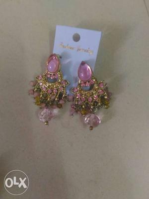 A pair of pink earrings for a reasonable price