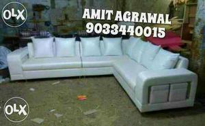 Beautiful looking white raxine sofa for economy price