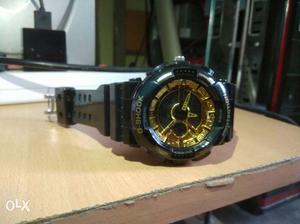 Black And Yellow Casio G-Shock Round Watch