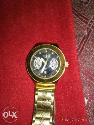 Black Faced Chronograph Watch With Gold Links