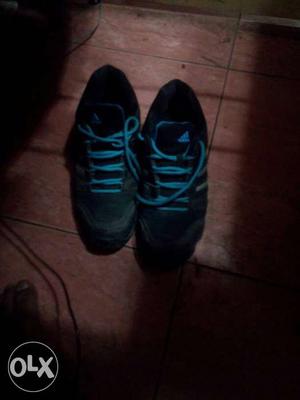 Black-and-blue Adidas Running Shoes