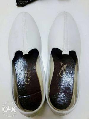 Black-and-white Leather Slip Ons