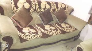 Brown Cushion Couch And Throw Pillows
