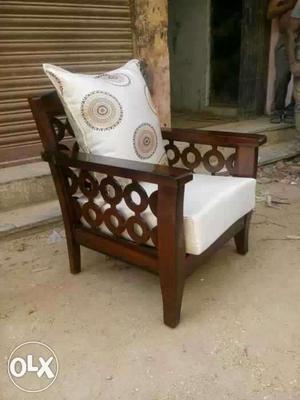 Brown Wooden Based White Padded Arm Chair