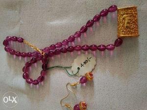 Gold Pendant Purple Beaded Necklace And Pair Of Purple