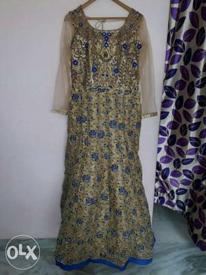 Golden and blue colour gown...