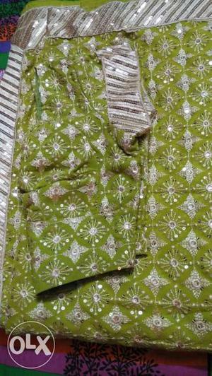 Green And Gray Floral Textile