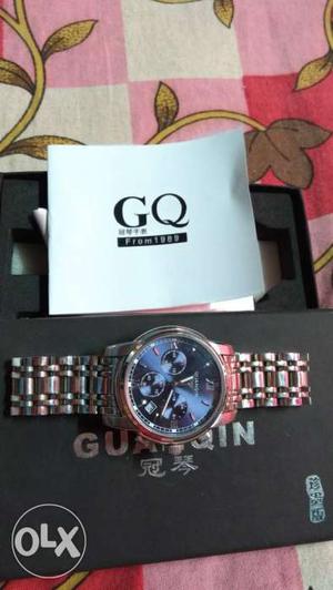 Guanqin Wrist Watch. Stainless steel. Branded
