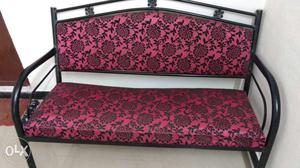 Pink And Black Floral Sofa With Black Metal Base