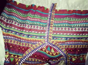 Pink, Red, White And Green Tribal Print Textile