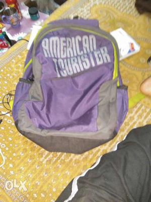 Purple, Yellow, And Gray America Tourister Backpack